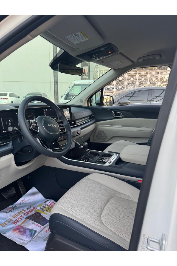 Rent Kia Carnival WHITE 2025 in Dubai , UAE 