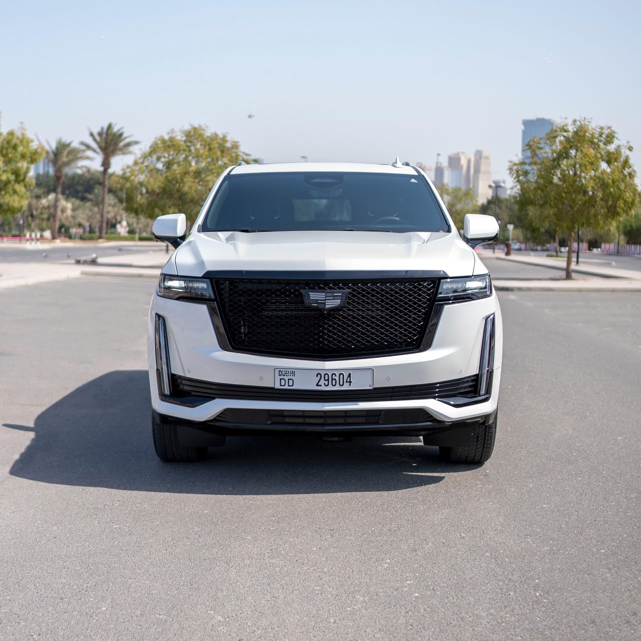 Rent Escalade WHITE 2025 with chauffeur in Dubai , UAE 